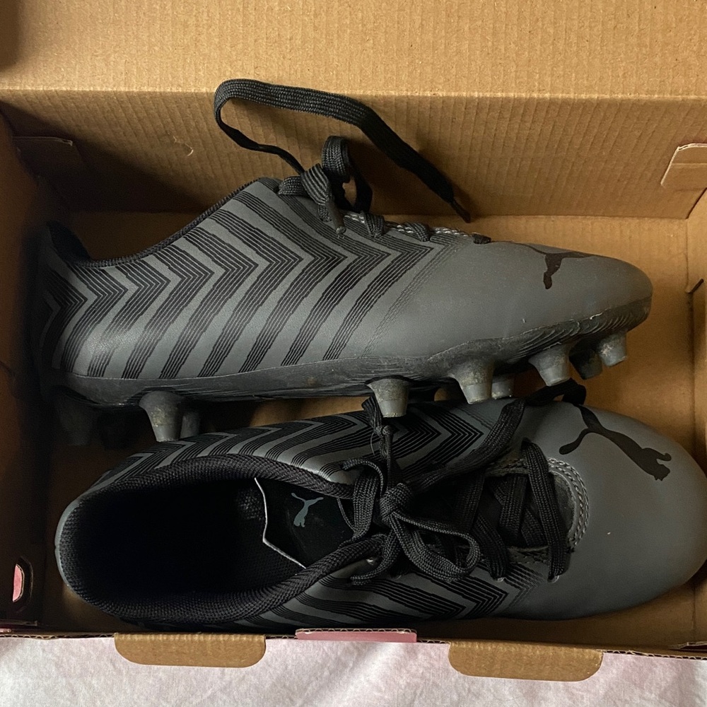 Kids soccer cleats, worn about 5 or 6 times.